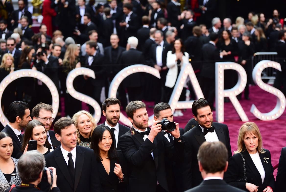 Television studio lighting rig shining down on an empty set